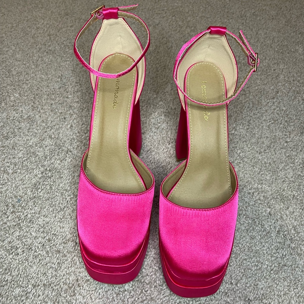 Fuchsia ankle strap platform heel. Heel is 5 inches.
